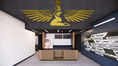 Architectural rendering of the lobby of the revitalized Isis Theatre in 克里特岛, Nebraska. A golden representation of the ancient Egyptian goddess Isis is prominently featured on the wall above a bronze art deco sales and concessions counter. A blue wall with a gold art deco motif to the 左 displays the names of donors and a wall on the 正确的 is painted white with the same gold art deco motif. Doors on either side of the wall behind the counter lead to the theater and other amenities. 